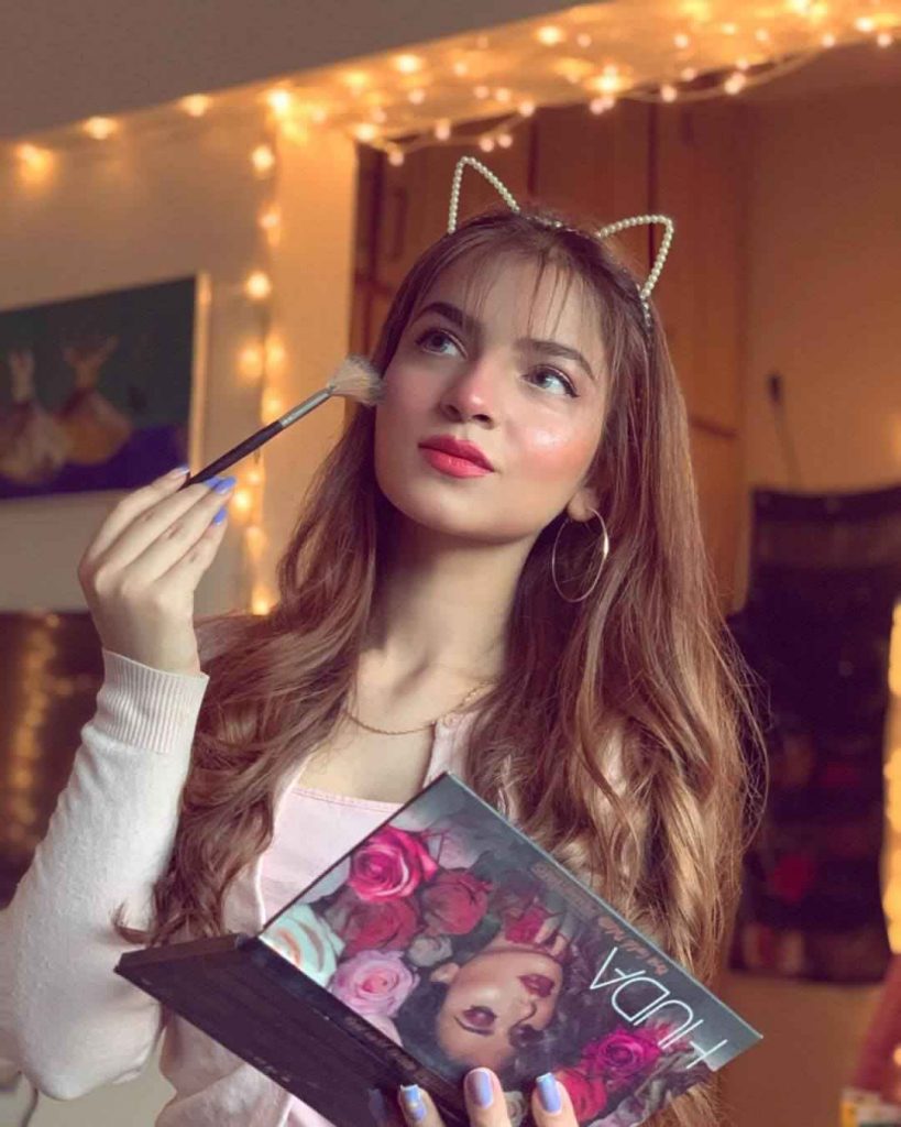 This image shows Dananeer at her home wearing makeup