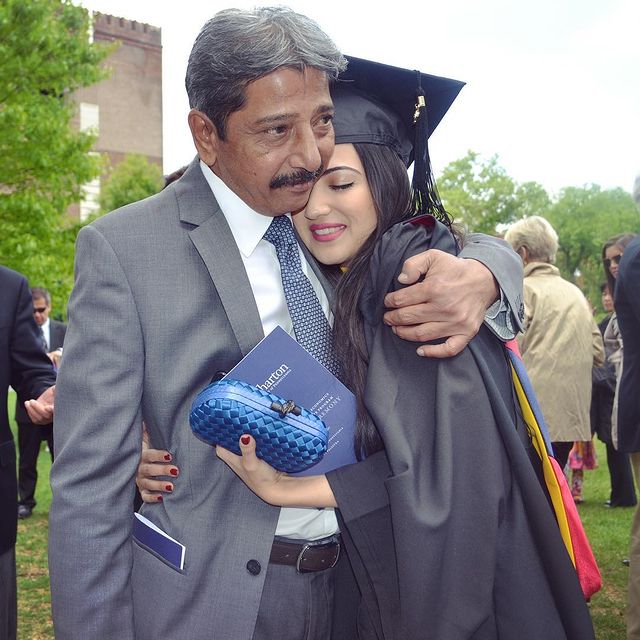 Ayman happily hugged his father after graduating