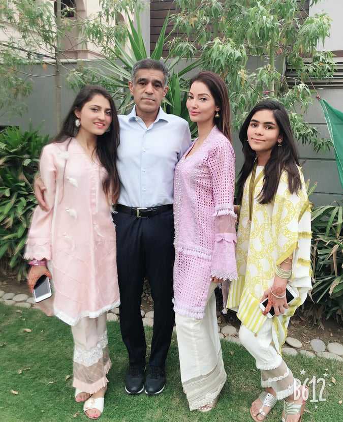 A family photo of Tania Hussain, her sister, her mother, and her father