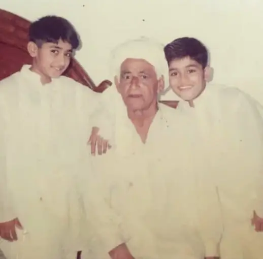 With His Brother and Grandfather