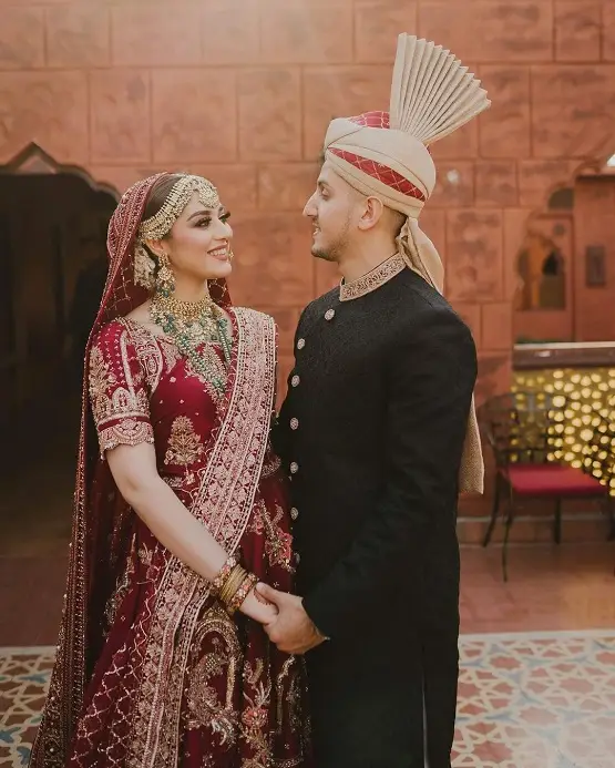 Her groom, Mukhteyar Khan wore a black sherwani