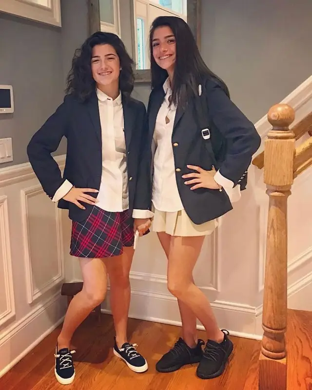 An old photo of both sisters, Charli D'Amelio and Dixie D'Amelio, in a school uniform.