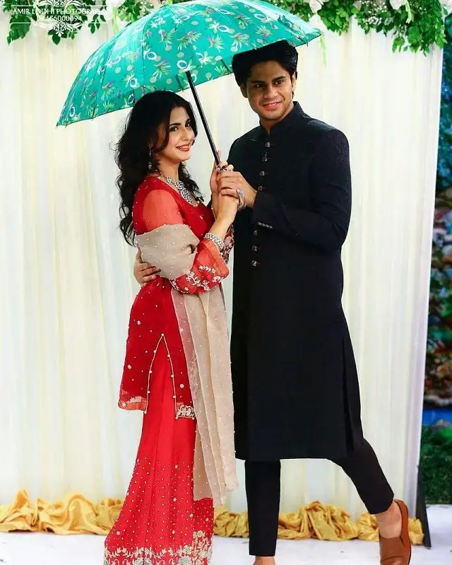 Haris and Maryam posing for their wedding photoshoot.