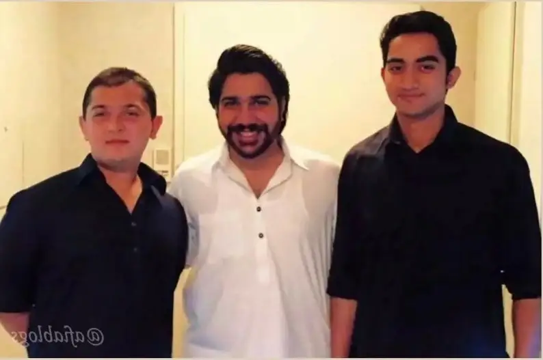 an old photo of Saadain Imran Sheikh with his younger brothers.