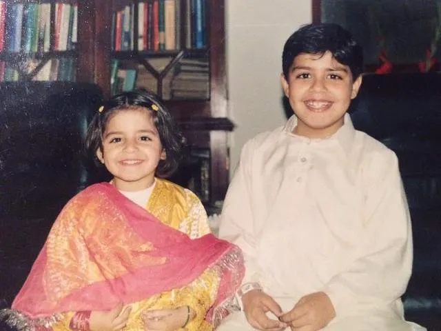 A childhood picture of her with her brother Zain Peerzada.