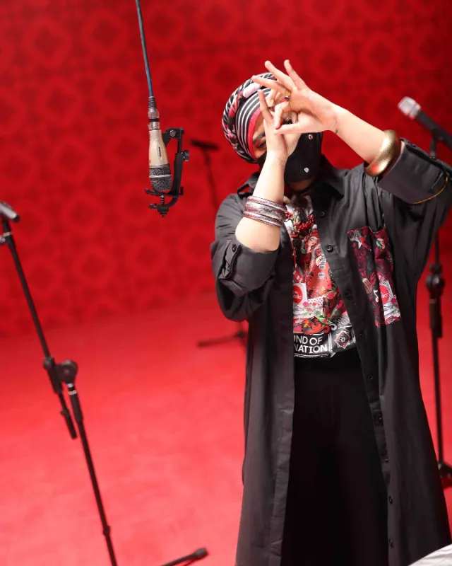 A Rare photo of Coke Studio rapper Eva B wearing a hijab.
