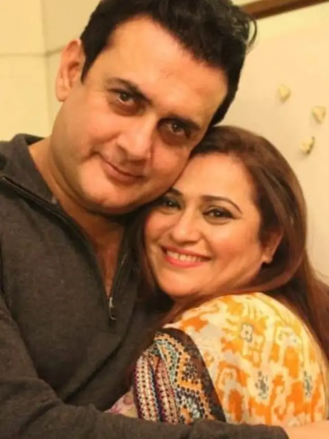 Her father Shahood Alvi with his wife Samia.