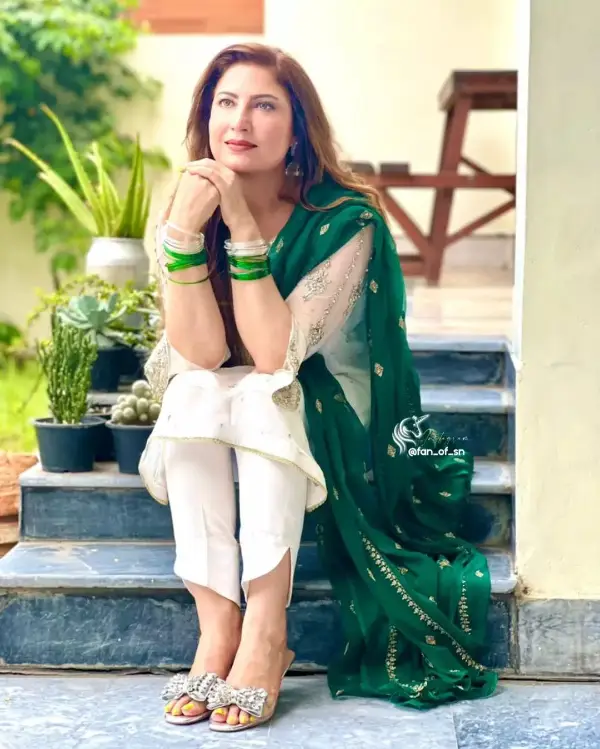 She looks Elegance as She Poses in a White and Green Contrast