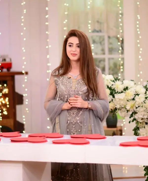 Aleena Salman stands in the kitchen during a segment in the show