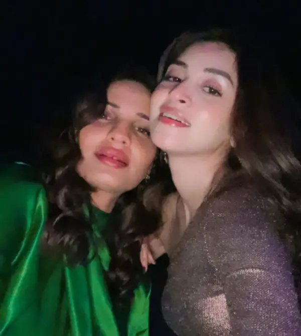 Anmol Baloch and her friend take a selfie