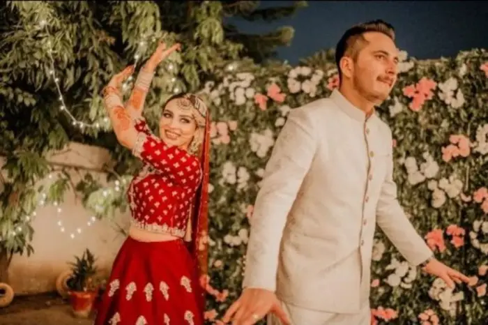 Another picture of Mehar Bano enjoying her wedding day by dancing with her husband