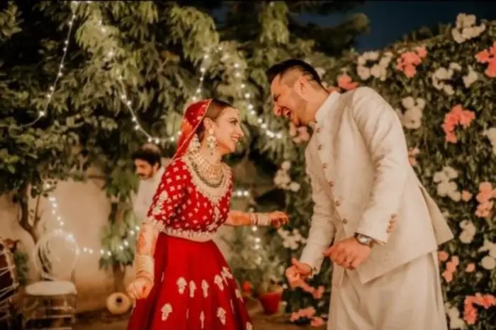 A picture of Mehar Bano enjoying her wedding day by dancing with her husband