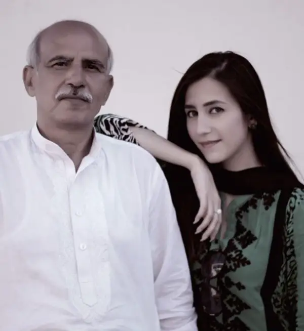 An image of her with her father