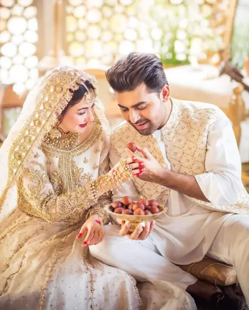 An image of the actress and the actor enjoying Gulab Jamun together