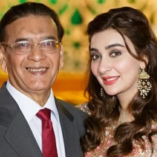 A rare family photo of Aisha Uqbah Malik with her father.