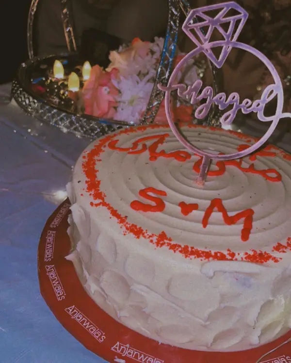Here is a picture of her engagement cake that she presented to her husband