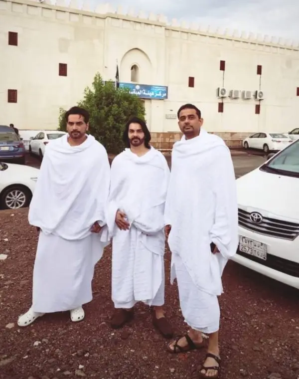 A picture of Humayun Saeed wearing Ihram with his family