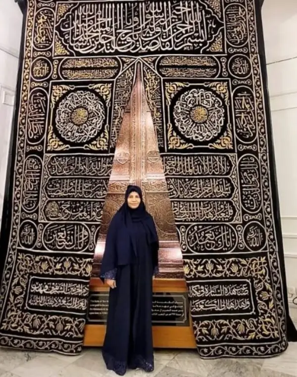 A photo of the wife of Humayun Saeed wears an abaya