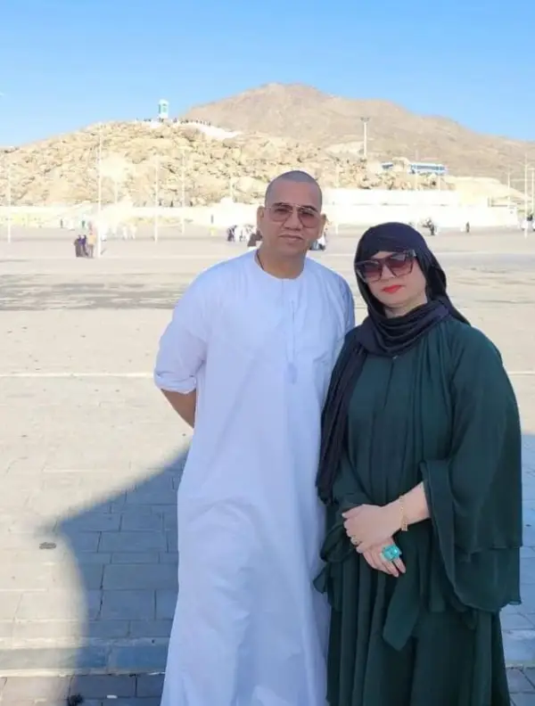 Here is a picture of her mother and father dressed in Abaya and ihram, respectively