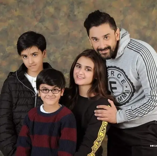 An image illustration of Salman Sheikh with his wife and sons, Muzamil and Ibrahim