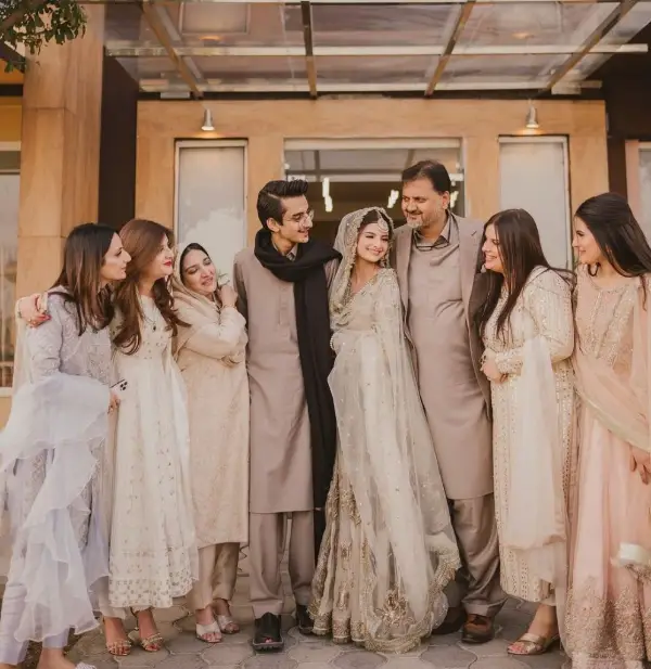 a picture of the bride with her family