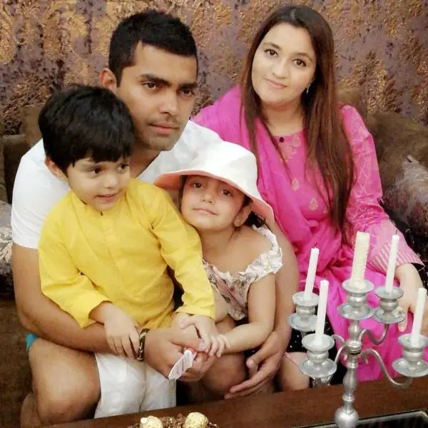 A beautiful picture of Umar Akmal and his family, including his wife, son, and daughter