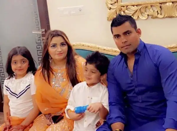Umar Akmal and his wife celebrating Eid al-Fitr in their home