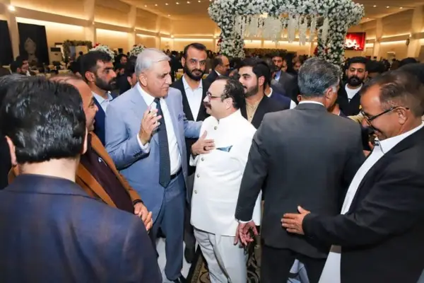 Qamar Javed Bajwa with a guest during the wedding