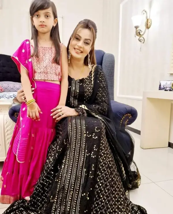 Sadia Imam and her daughter pose together
