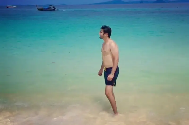 Ahsan Mohsin Ikram strolls along the beach