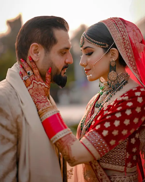 Becks Khan and her husband posing for a wedding photo