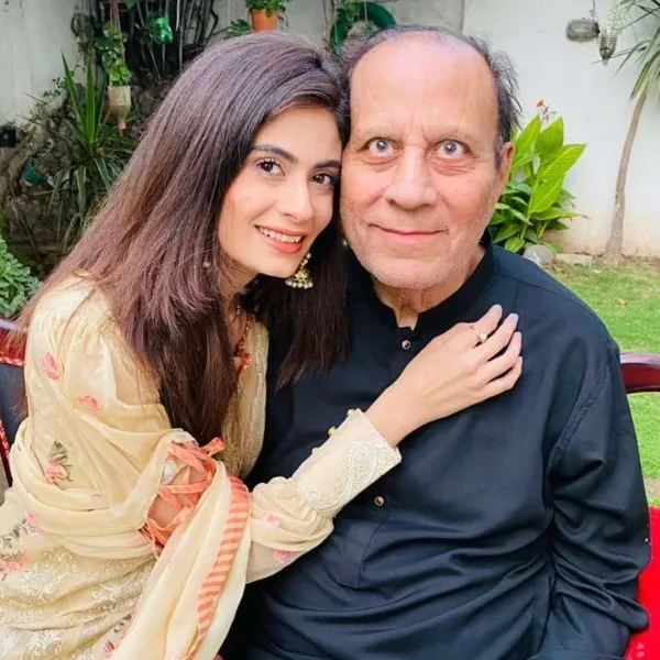 A picture of her with her father Iftikhar Ahmed