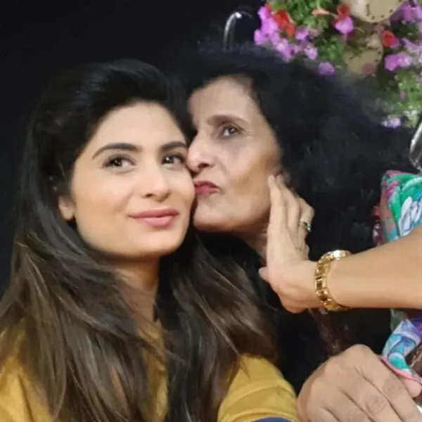A picture of her with her mother Rehana Iftikhar.