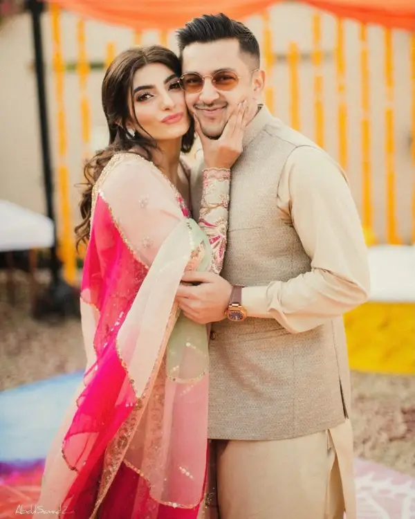The photo shows his brother Owais Khan with his wife