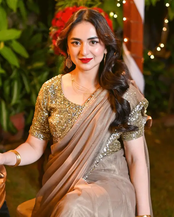 Yumna Zaidi looks stunning in a golden silk saree