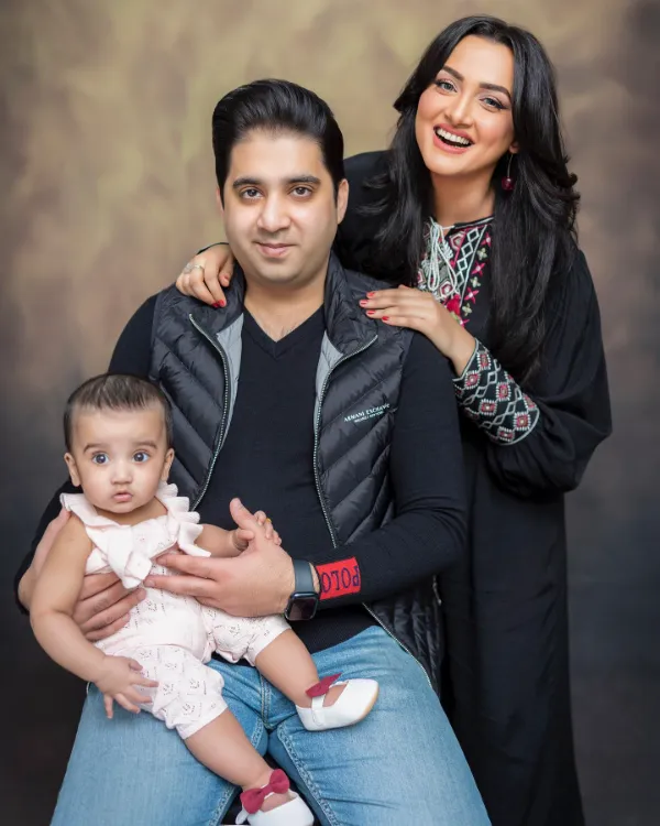 A family picture of Kiran Tabeer with her husband
