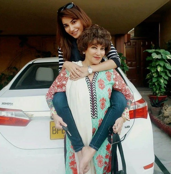 A picture of her with her mother Naheed Waqar