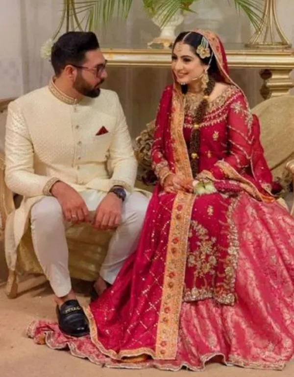 rahma-khan-poses-with-her-husband-at-their-wedding-ceremony