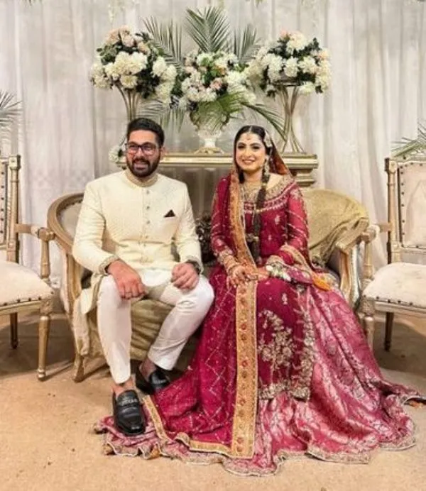 rahma-khan-poses-with-her-husband-at-their-wedding-ceremony