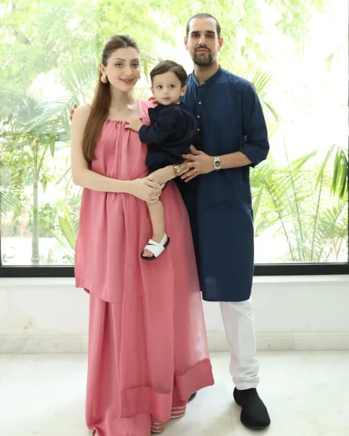 Neha with her husband and first baby boy