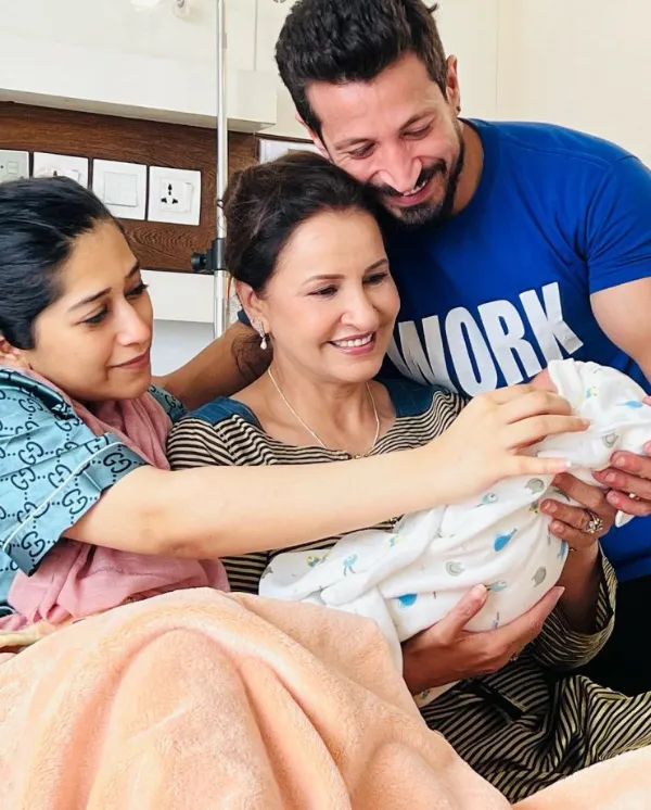 Salman Faisal and Neha Malik hold their second child